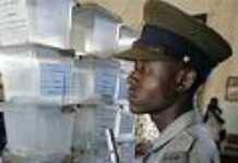 Zimbawean policemen vote under watchful eyes of Zimbawean policemen vote under watchful eyes of