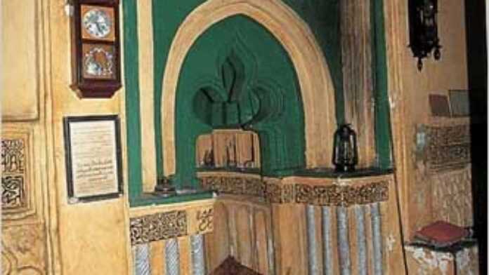 Before the restoration, water damage showed on the mihrab of the mosque near Kizimkazi in Zanzibar.